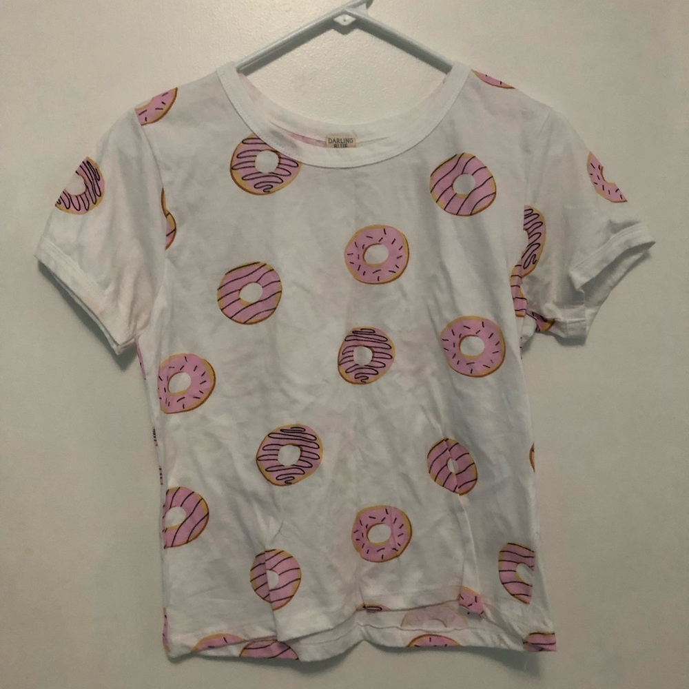 white shirt with pink donuts